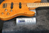 2005 Fender American Deluxe Jazz Bass QMT, Amber